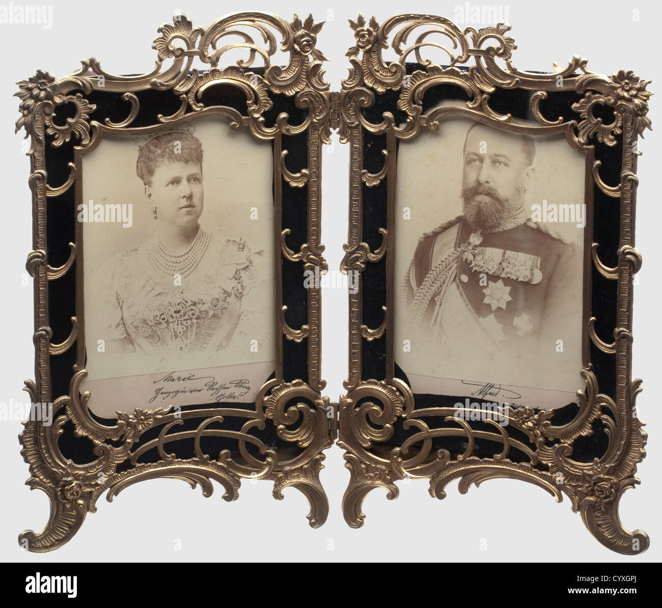 Grand Duchess Maria Alexandrowna(1853 - 1920)Duke Alfred von Saxe-Coburg and Gotha(1844 - 1900)dated 1893,a framed presentation photograph of the ducal couple.Photographs on reinforced cardboard,each of them with autograph signatures "Marie Herzogin von Sachsen Coburg Gotha 1893" and "Alfred Herzog von Sachsen Coburg Gotha 1893" in a finely made fire-gilt brass frame.Grand Duchess Maria Alexandrowna of Russia was the daughter of Tsar Alexander II.She married His Royal Highness Alfred of Great Britain on 23 January 1874,who became reigning Duke of Saxe,Additional-Rights-Clearences-Not Available Stock Photo