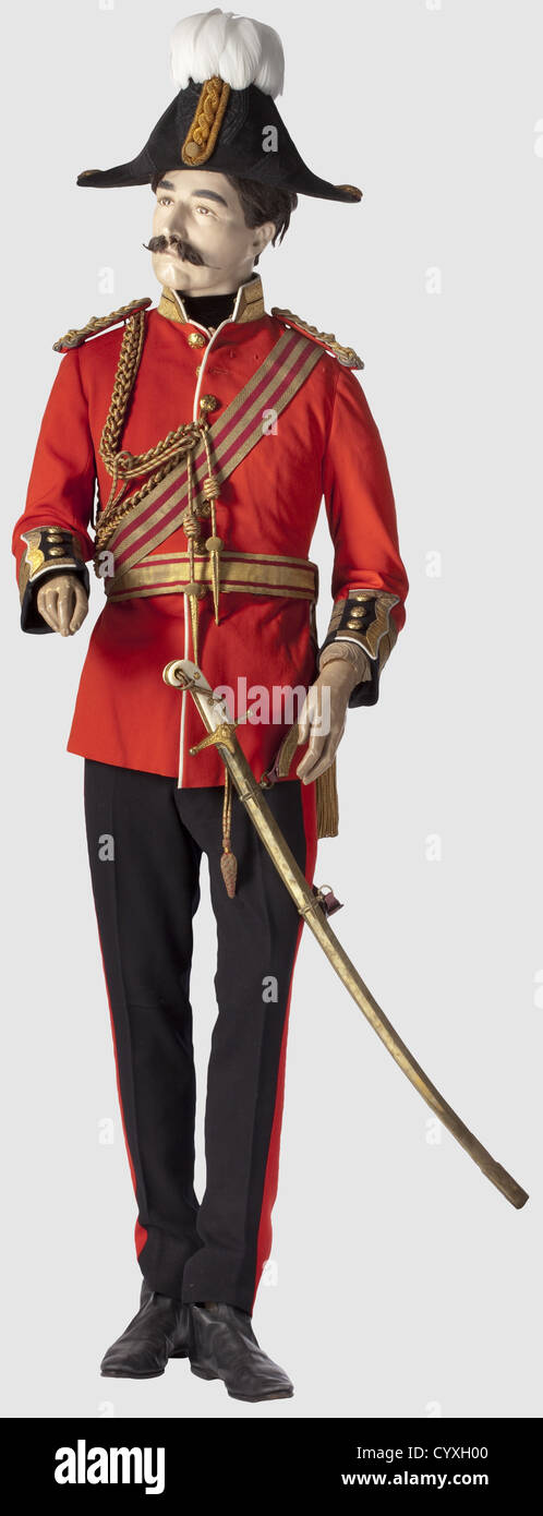 A uniform,a bicorne and a sabre,of a Major General circa 1900 The coat of red cloth,a wide gold border on the collars and sleeves,continuous white piping,the shoulder boards of heavy gold braid with applied service grade of a Major General(Brigadier),gold aiguillette for generals and a broad gold sash worked through in red.The trousers of dark blue cloth with sewn-on red lace stripes.Bicorne for generals of black mohair with a wide gold agrafe,red silk liner,brown sweat band and plume in a protective sheet metal box.The Model 1831 sabre for generals,Additional-Rights-Clearences-Not Available Stock Photo