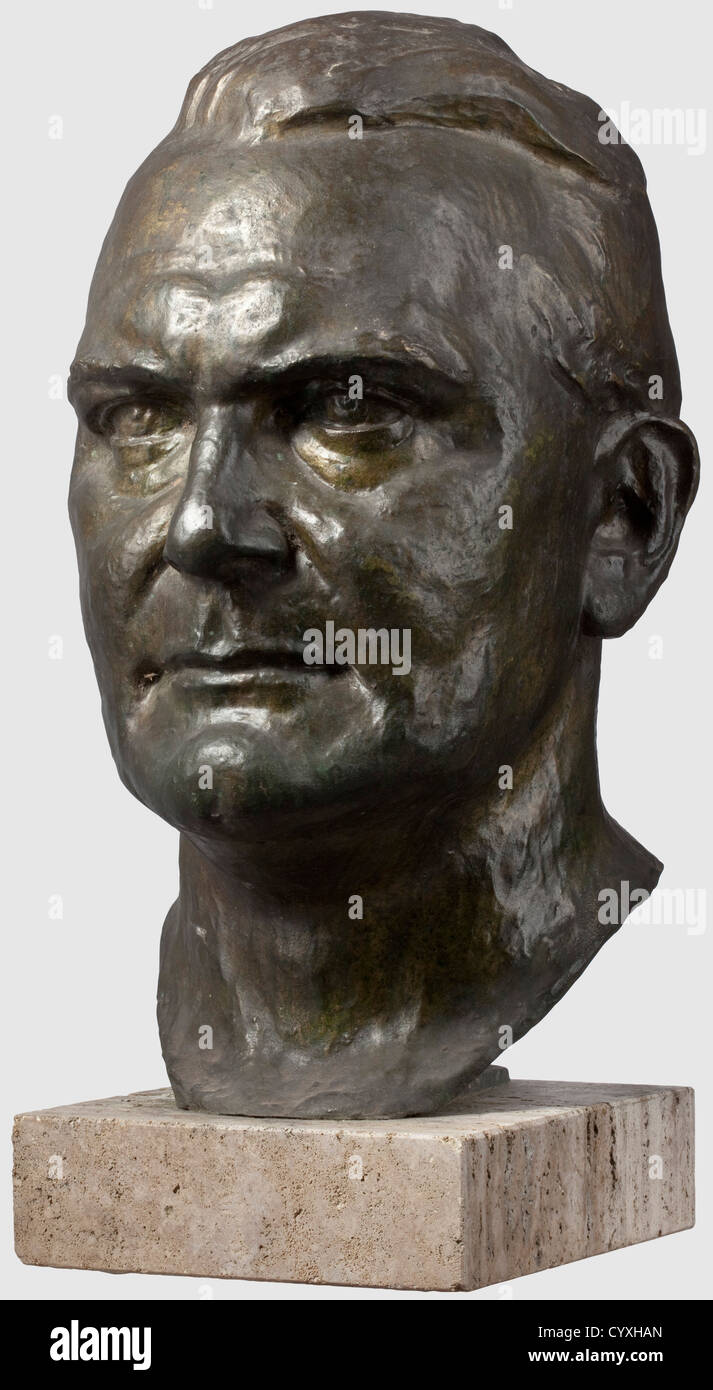 Erich Schmidt-Kestner (1877 - 1941), a larger than life-sized portrait head of Hermann Göring Dark patinated bronze, the reverse monogrammed 'E.S.K.' at the neck. Contemporary limestone pedestal. Total height 58 cm. For his expressive imagery, sculptor Erich Schmidt-Kestner won medals at the Great Art Exhibitions in 1901 and 1904 in Berlin and at the International Art Exhibition in Munich in 1905. His Adolf Hitler busts were well-known, and were exhibited in 1933 at the Königsberg Art Exhibition. His university lectures in Königsberg were followed by a professo, Stock Photo