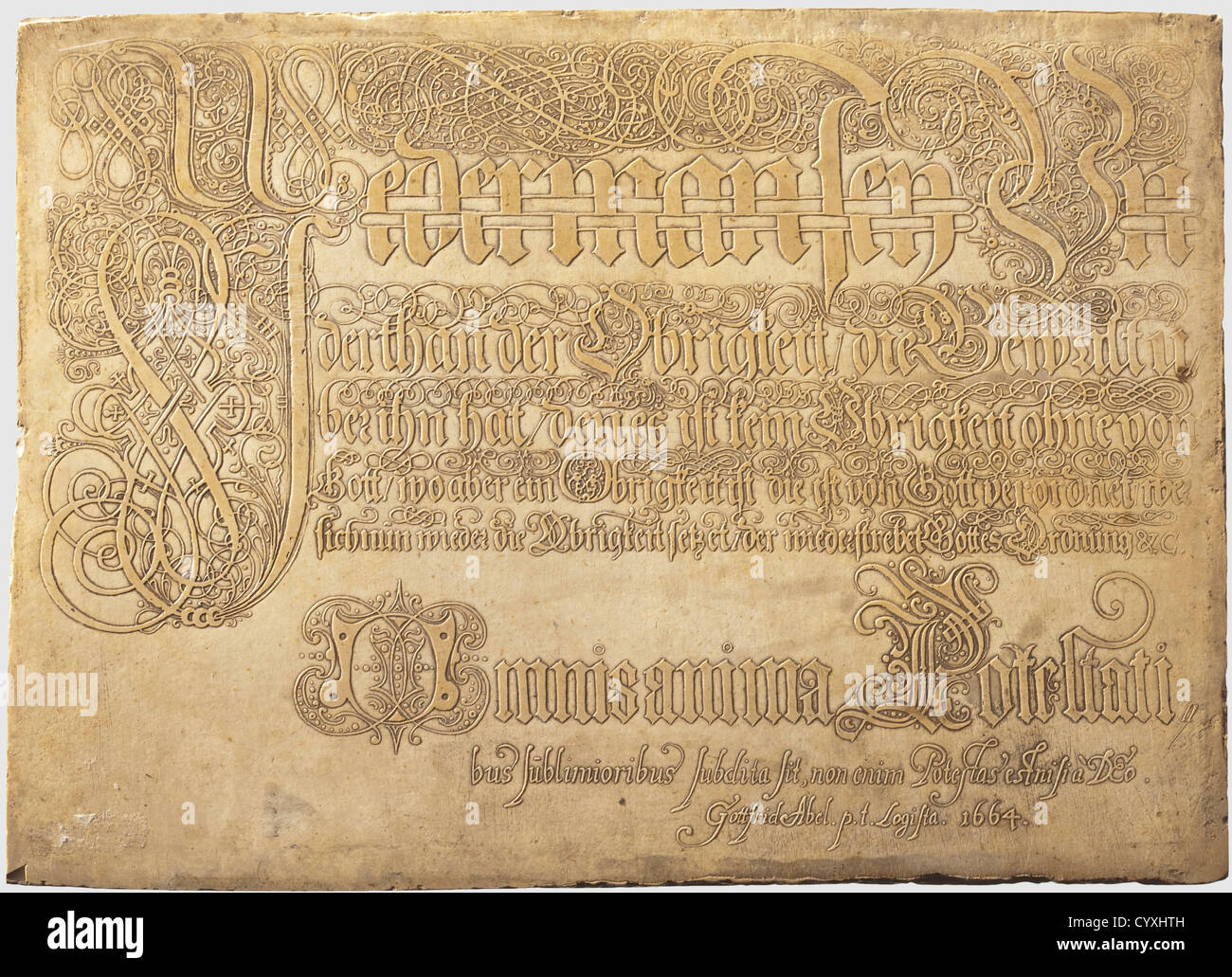 A Southern German decorative calligraphic plate,dated 1664 A rectangular plate of beige Solnhofer slate with artistically etched decoration on both sides.One side with elaborately decorative inscription 'Jeder Mann sei Untertan der Obrigkeit die Gewalt über ihn hat,denn es ist keine Obrigkeit ohne die von Gott...'(Let every soul be subject unto the higher powers.For there is no power but of God...)(Romans,Chapter 13).Signed 'Gottfried Abel p.t.logista 1664' on the lower edge.The opposite side has number games in Latin and German verse.There is old gi,Additional-Rights-Clearences-Not Available Stock Photo