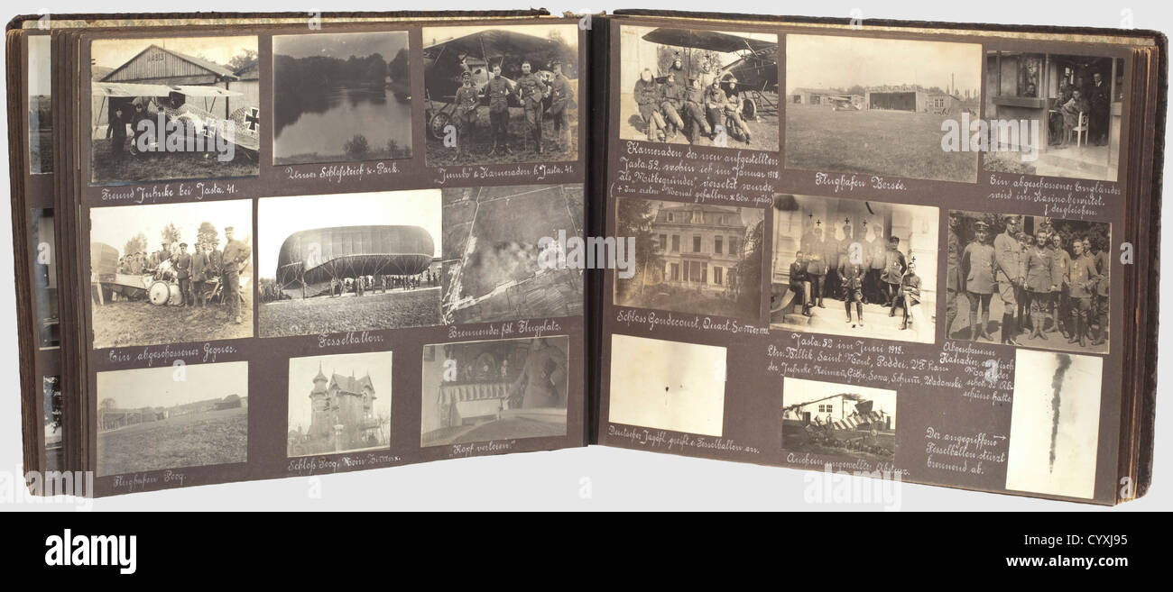 A photo album of a fighter pilot officer,at the Western front in the First World War Beautifully inscribed large photo album with a total of 288 pictures and a few newspaper articles,postcards and prints of combat activities.Photos of his training in Breslau,aerial shots of the front,highly interesting technical details of various aircraft models,partially with camouflage paintwork,vehicles and tanks,also highly revealing pictures of uniforms,military base,pictures of life at the front as experienced by members of the air corps etc.Spectacularly larg,Additional-Rights-Clearences-Not Available Stock Photo