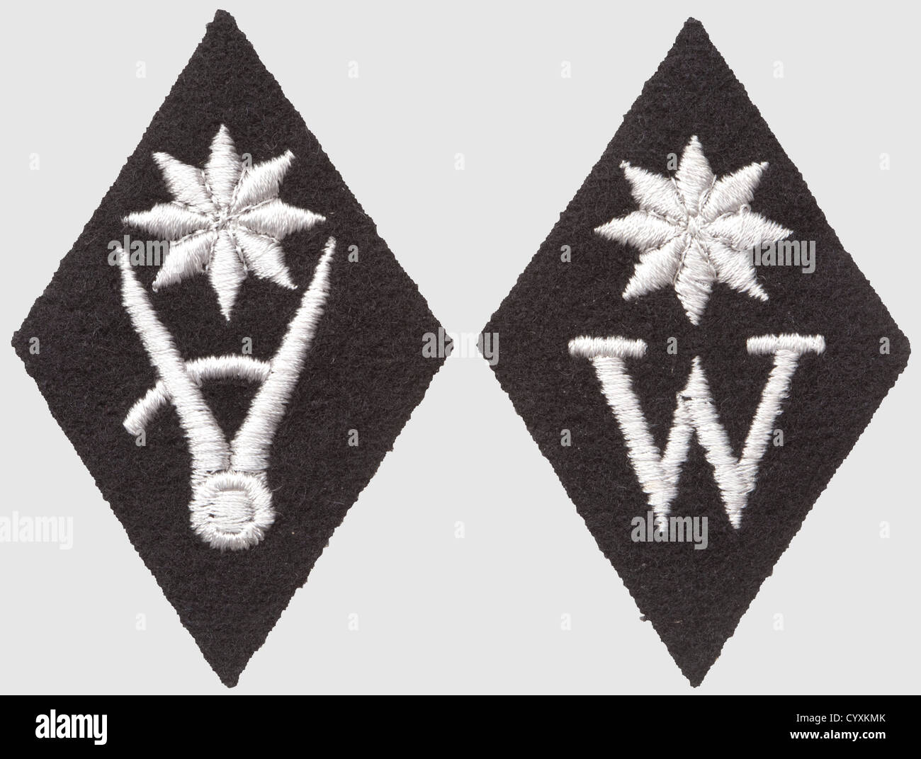 Two sleeve lozenges for personnel,in the SS-office for economy and administration,for the sections economy and construction industry. RZM-machine-embroidered version on black ground,historic,historical,1930s,1930s,20th century,secret service,security service,secret services,security services,police,armed service,armed services,NS,National Socialism,Nazism,Third Reich,German Reich,Germany,utensil,piece of equipment,utensils,object,objects,stills,clipping,clippings,cut out,cut-out,cut-outs,fascism,fascistic,National Socialist,Na,Additional-Rights-Clearences-Not Available Stock Photo