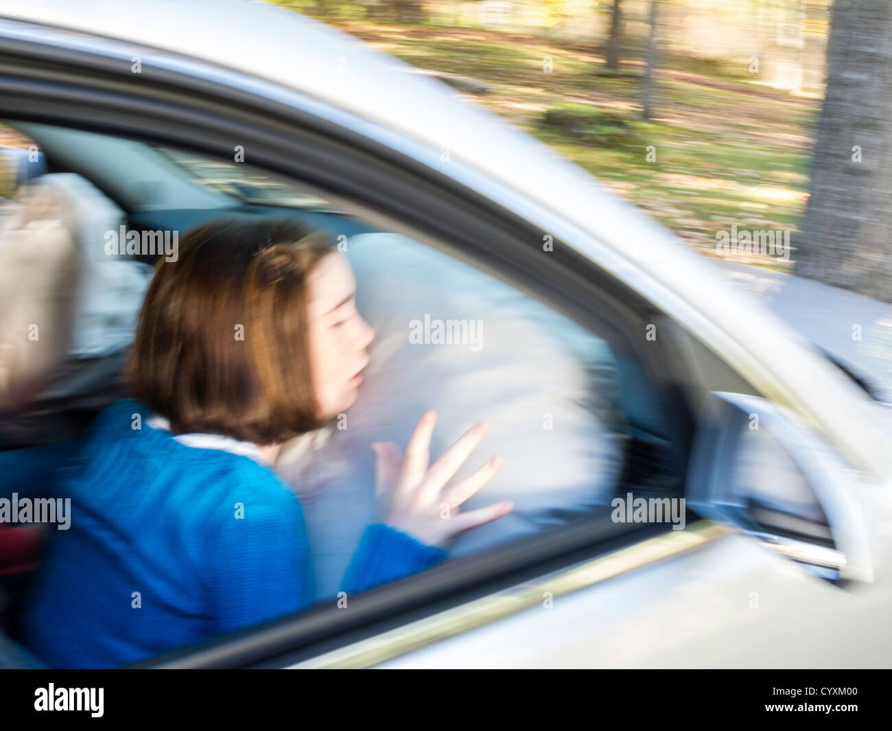 Deployed Airbag with Child Passenger Stock Photo