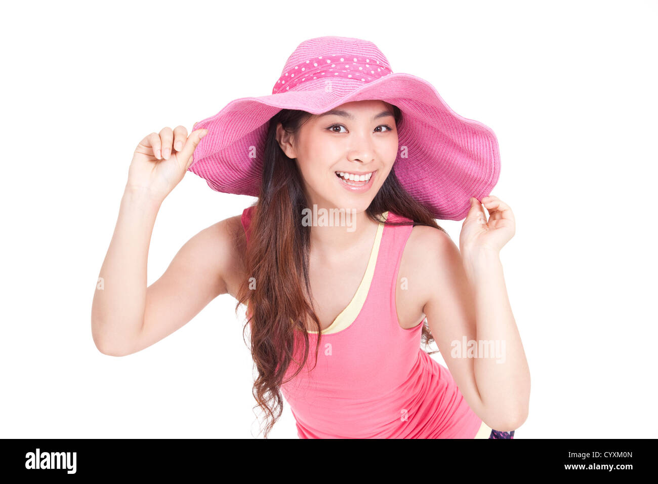 Young woman wearing sun hat Stock Photo - Alamy