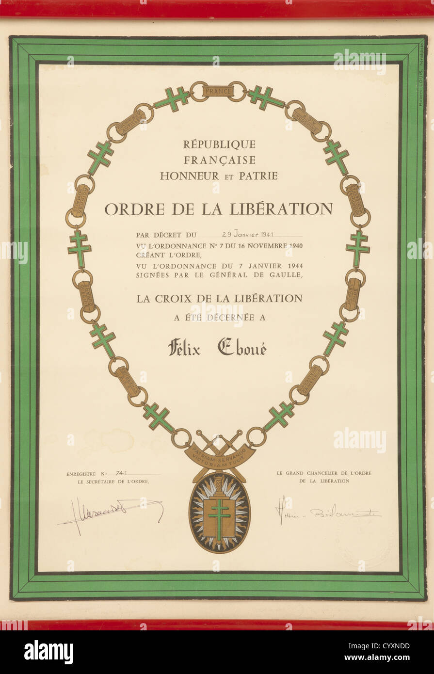 RESISTANCE ET FORCES FRANCAISES LIBRES,Gouverneur-Général Félix Eboué(1884 - 1944),Eugénie et Ginette Eboué,important ensemble de documents. Diplôme de Compagnon de l'Ordre de la Libération('3ème modèle'),la Croix de la Libération ayant été décernée à Félix Eboué par décret du '29 Janvier 1941'(date manuscrite,ainsi que le prénom,le nom et le numéro d'enregistrement '741'),tampon à sec de la Grande Chancellerie de l'Ordre de la Libération et signatures autographes du Grand Chancelier Claude Hettier de Boislambert et du secrétaire de l'Ordre Jules Murr,Additional-Rights-Clearences-Not Available Stock Photo