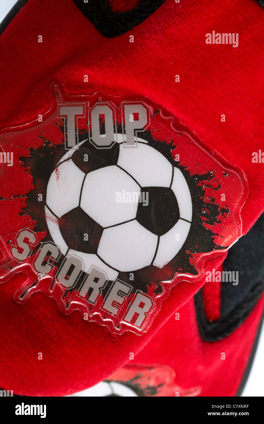 Top Scorer label on pair of boy's football slippers Stock Photo