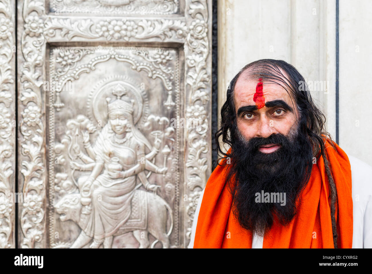 India, Punjab, Amritsar, Hindu priest in front of Durgiana Temple Stock Photo