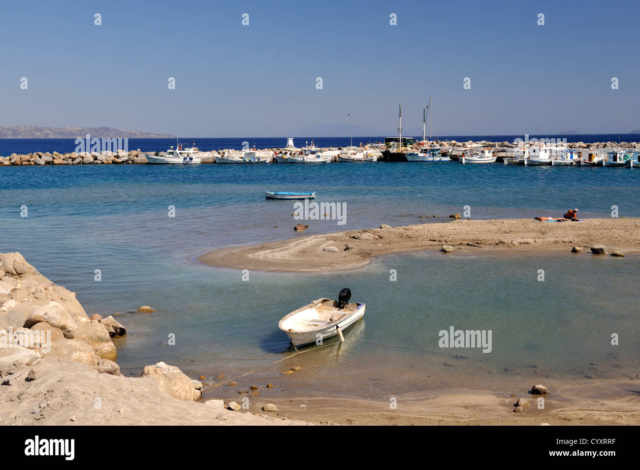 Small fishing harbour at the village of Kamari on Kamari Bay near Kefalos island of Kos, Greece Stock Photo