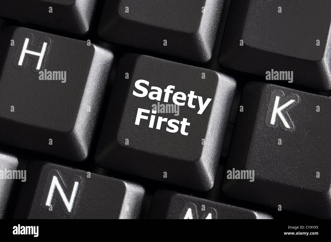 safety first concept with key on computer keyboard Stock Photo - Alamy