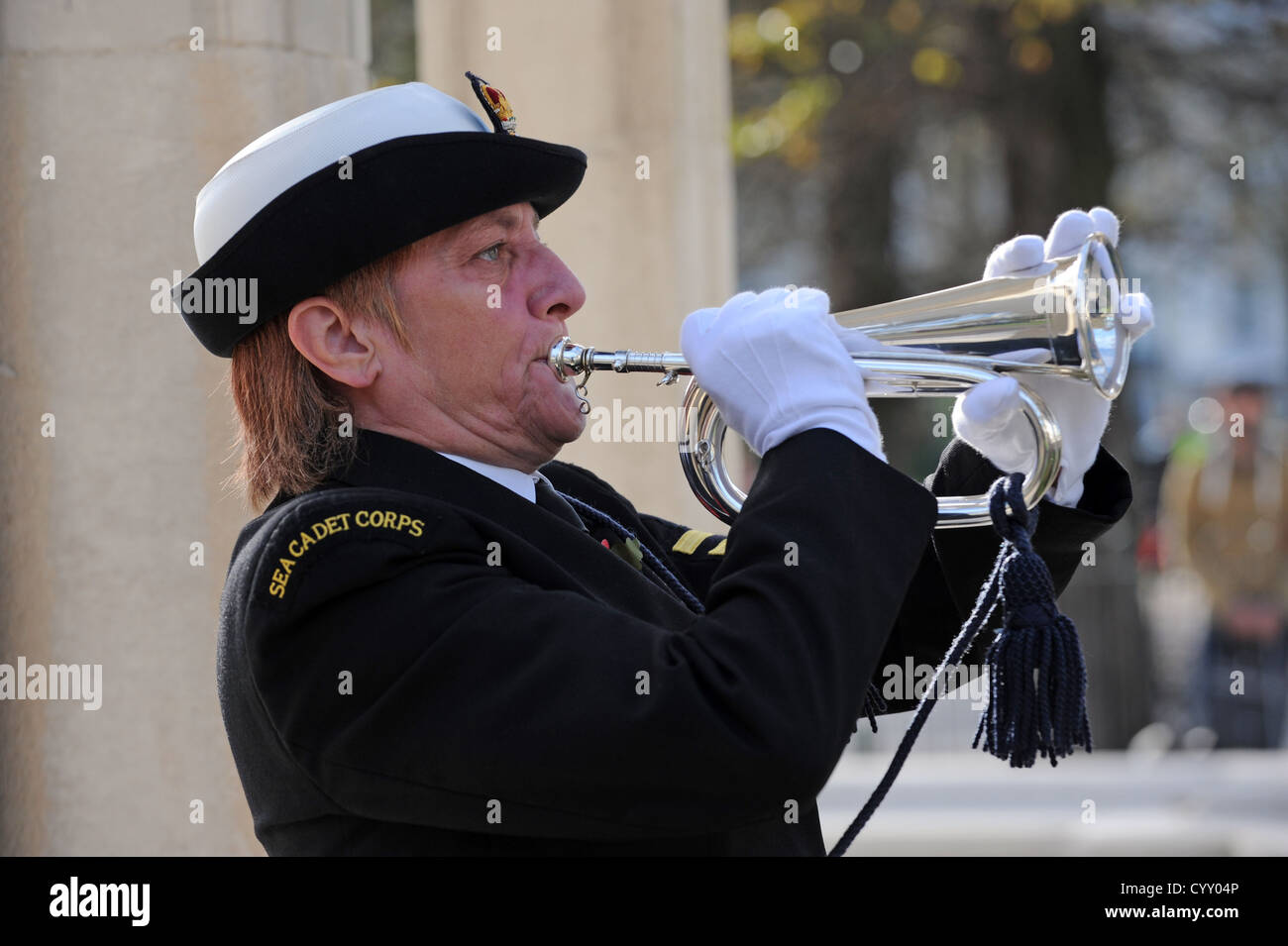 A bugler plays the last post during a special remembrance blessing at the war memorial in Brighton Stock Photo