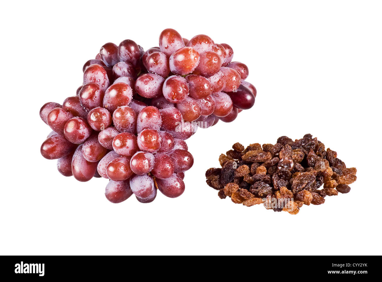 Bunch of red grapes and raisins on white background Stock Photo