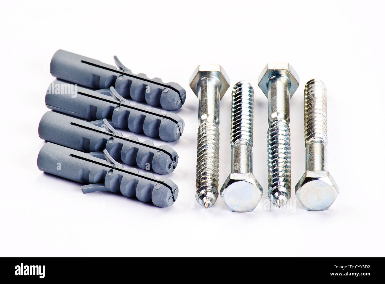 Raw plugs and bolts over white background Stock Photo Alamy