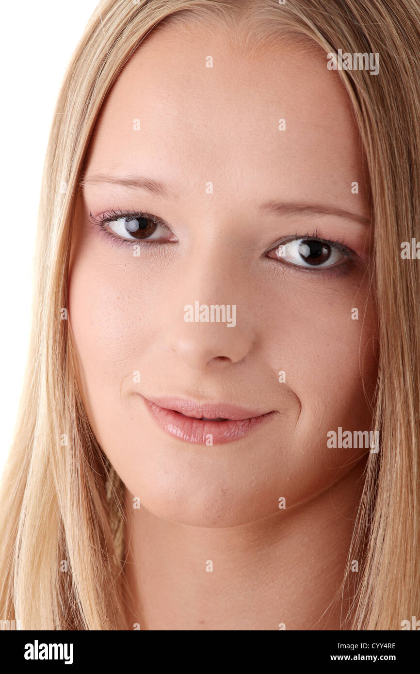 Closeup portrait of a happy young woman isolated on white background ...