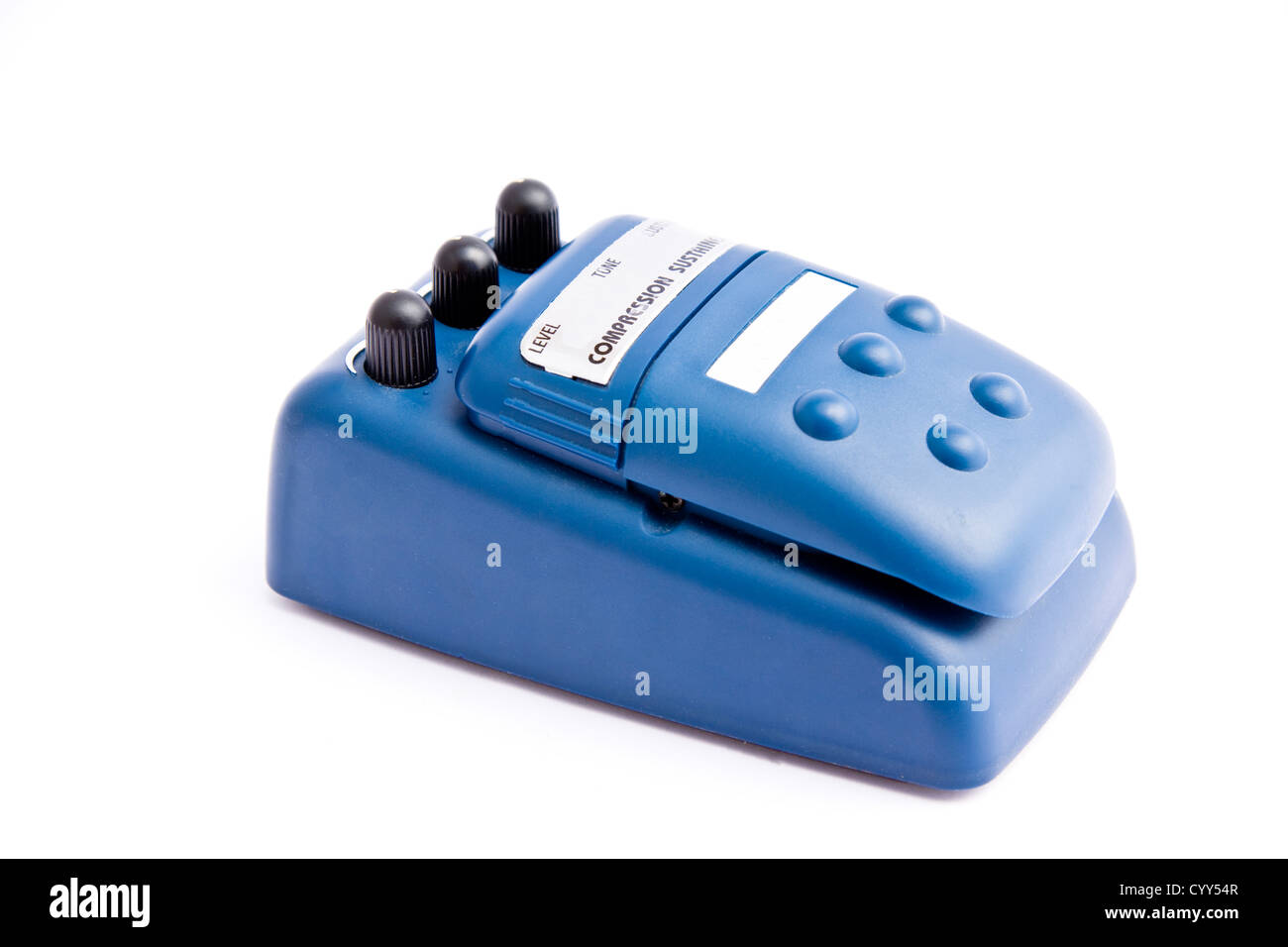 A compression sustain pedal for guitars over white background Stock Photo