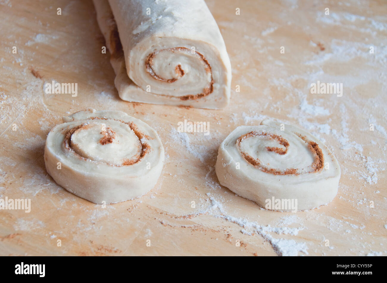 Sweet raw buns with cinnamon and sugar Stock Photo