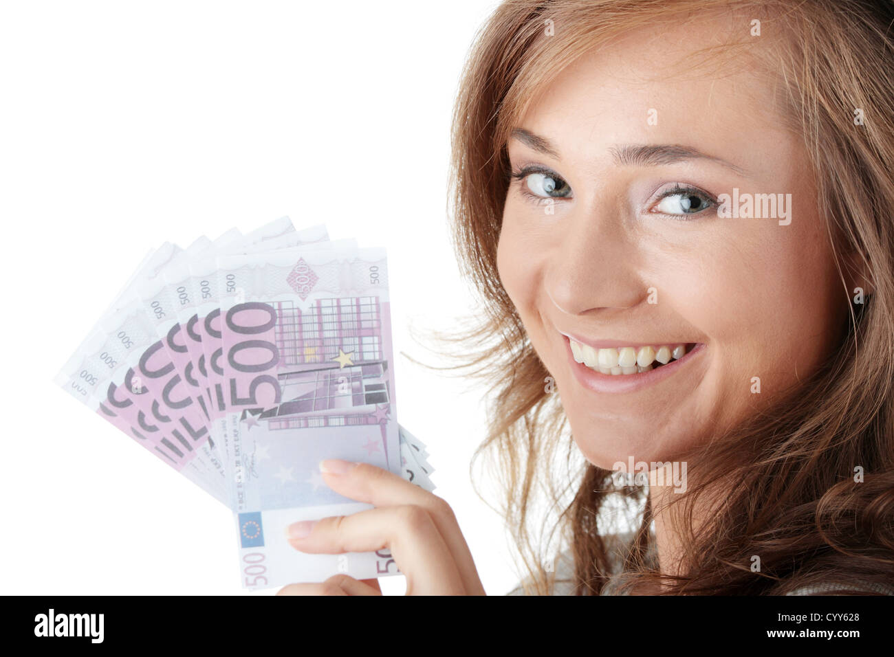 Happy young woman holding money isolated on white Stock Photo - Alamy