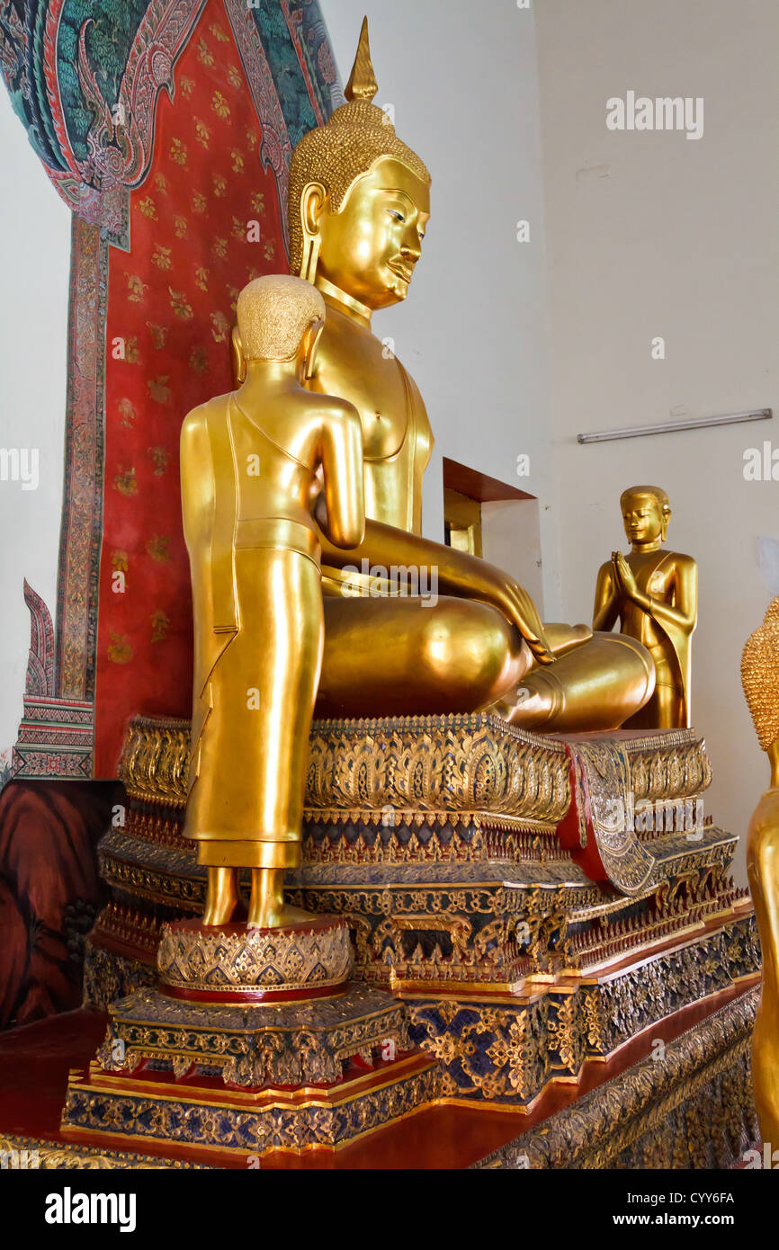 Golden Buddha Statues in the Temple Wat Pho in Bangkok, Thailand Stock ...