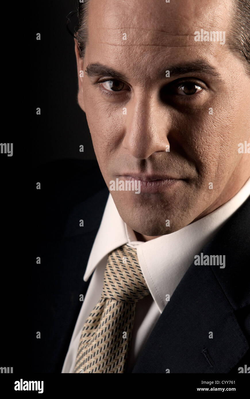 Portrait of a successful businessman looking to camera Stock Photo - Alamy