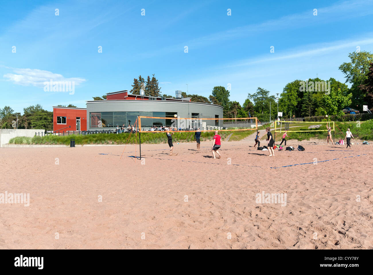 Finns playing volleyball by Hietaniemi Beach Sandstrand on the public beach in Helsinki Finland Stock Photo