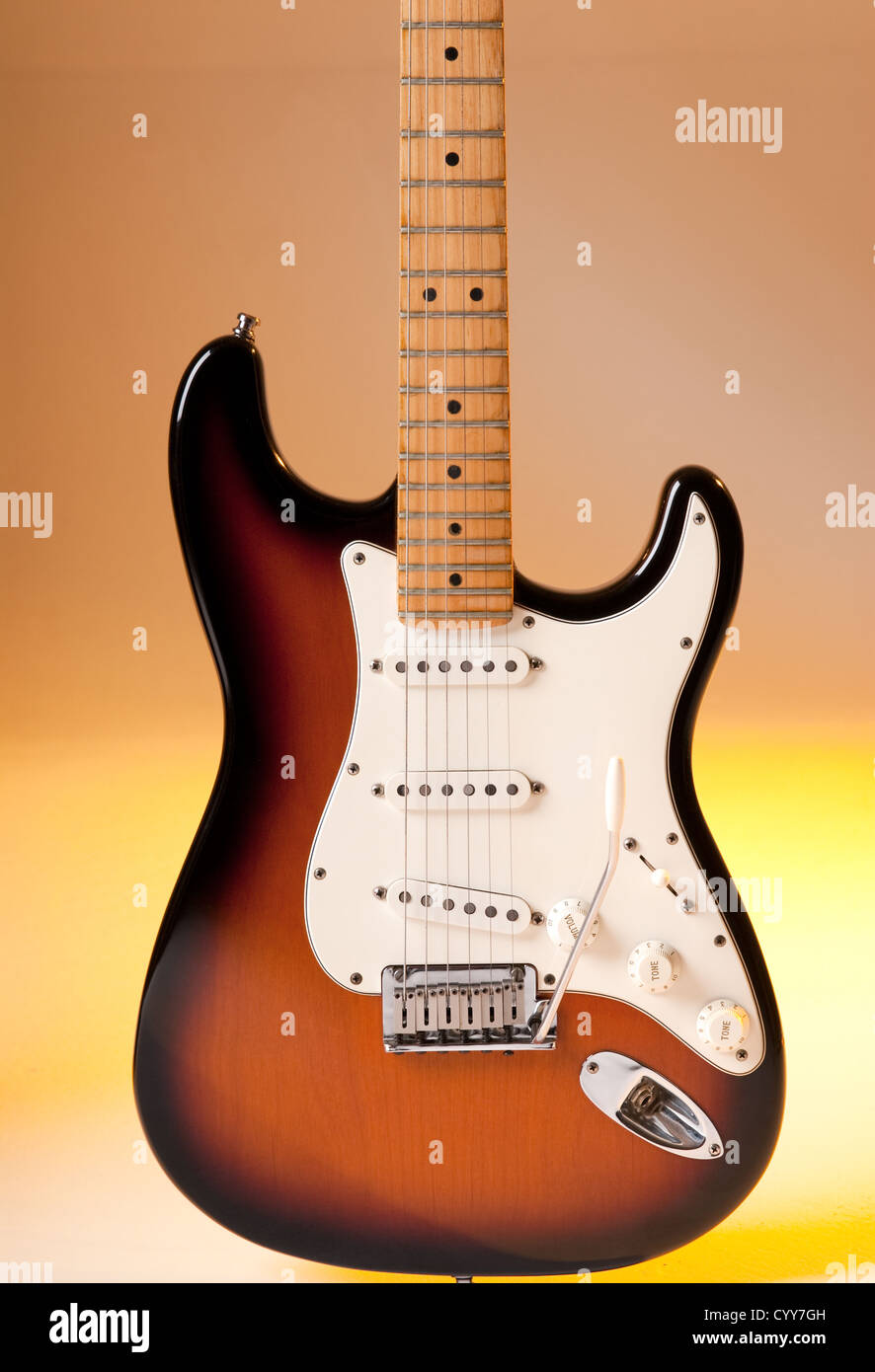 Electric guitar detail with multicolour lighting. Stock Photo