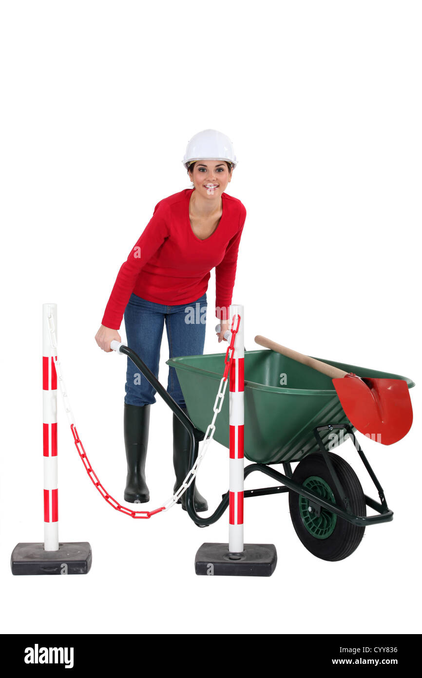 Woman construction worker on white background Stock Photo - Alamy