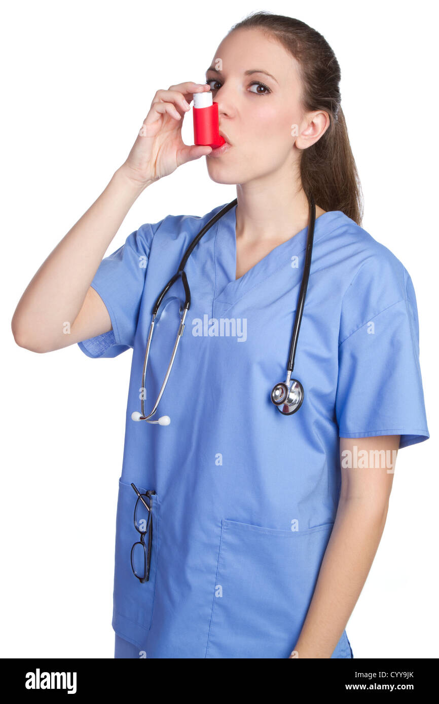 Pretty nurse using asthma inhaler Stock Photo Alamy