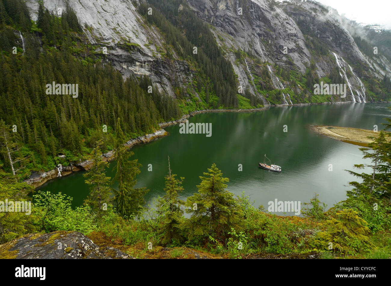 Small cruise boat in Fords Terror, Tongass National Forest, Alaska. Stock Photo