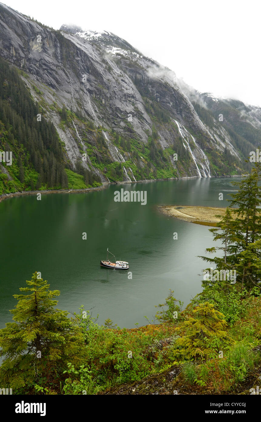 Small cruise boat in Fords Terror, Tongass National Forest, Alaska. Stock Photo