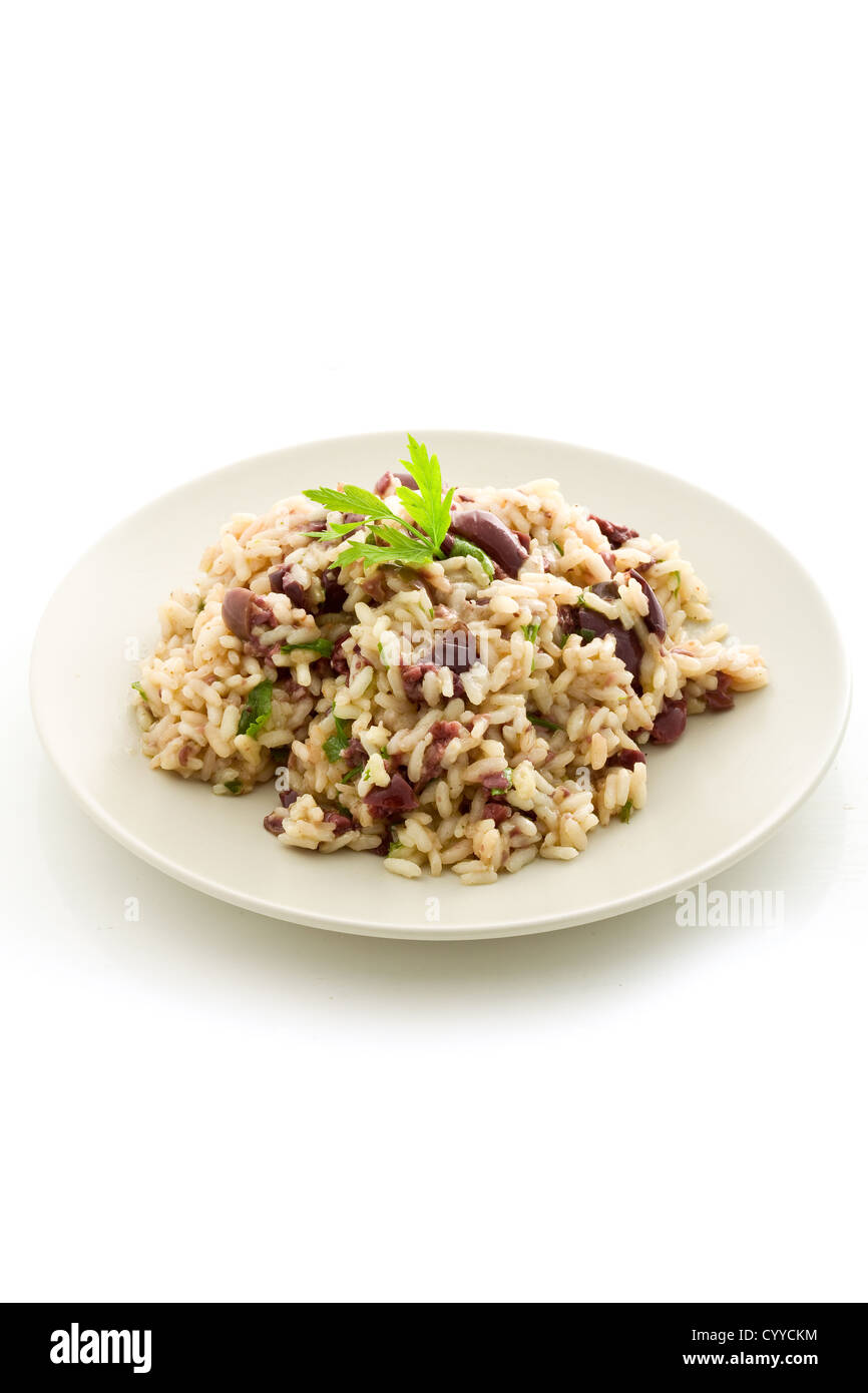 delicious risotto with black olives on white isolated background Stock ...