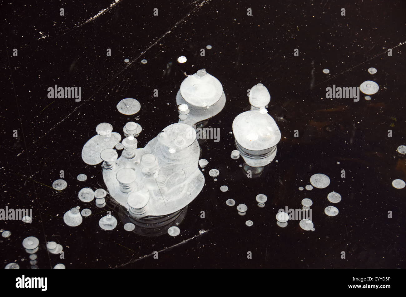 Black and white image of air bubbles in the ice Stock Photo