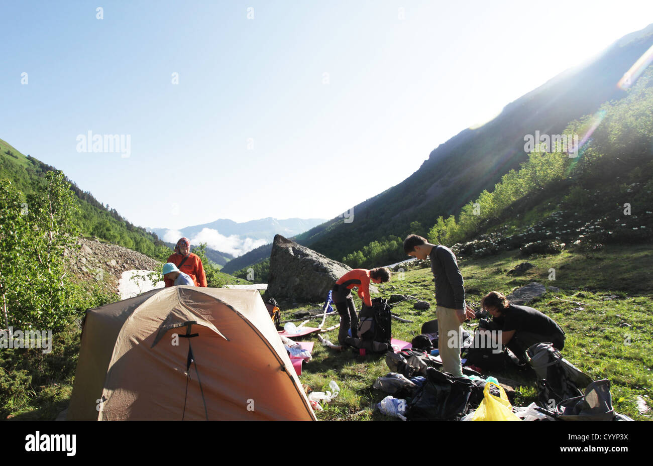 People in mountains Stock Photo - Alamy