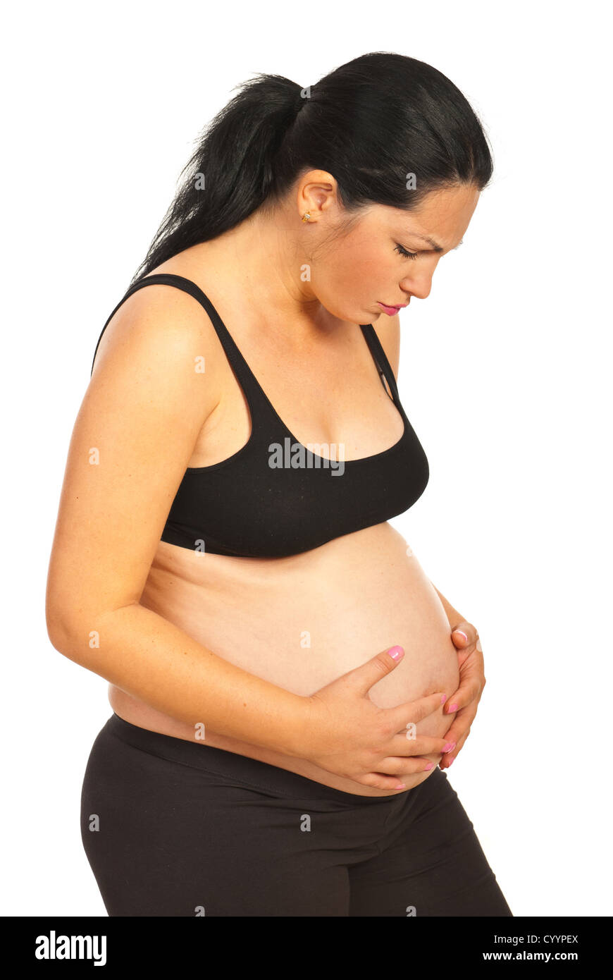 Pregnant woman having bad stomach ache isolated on white background