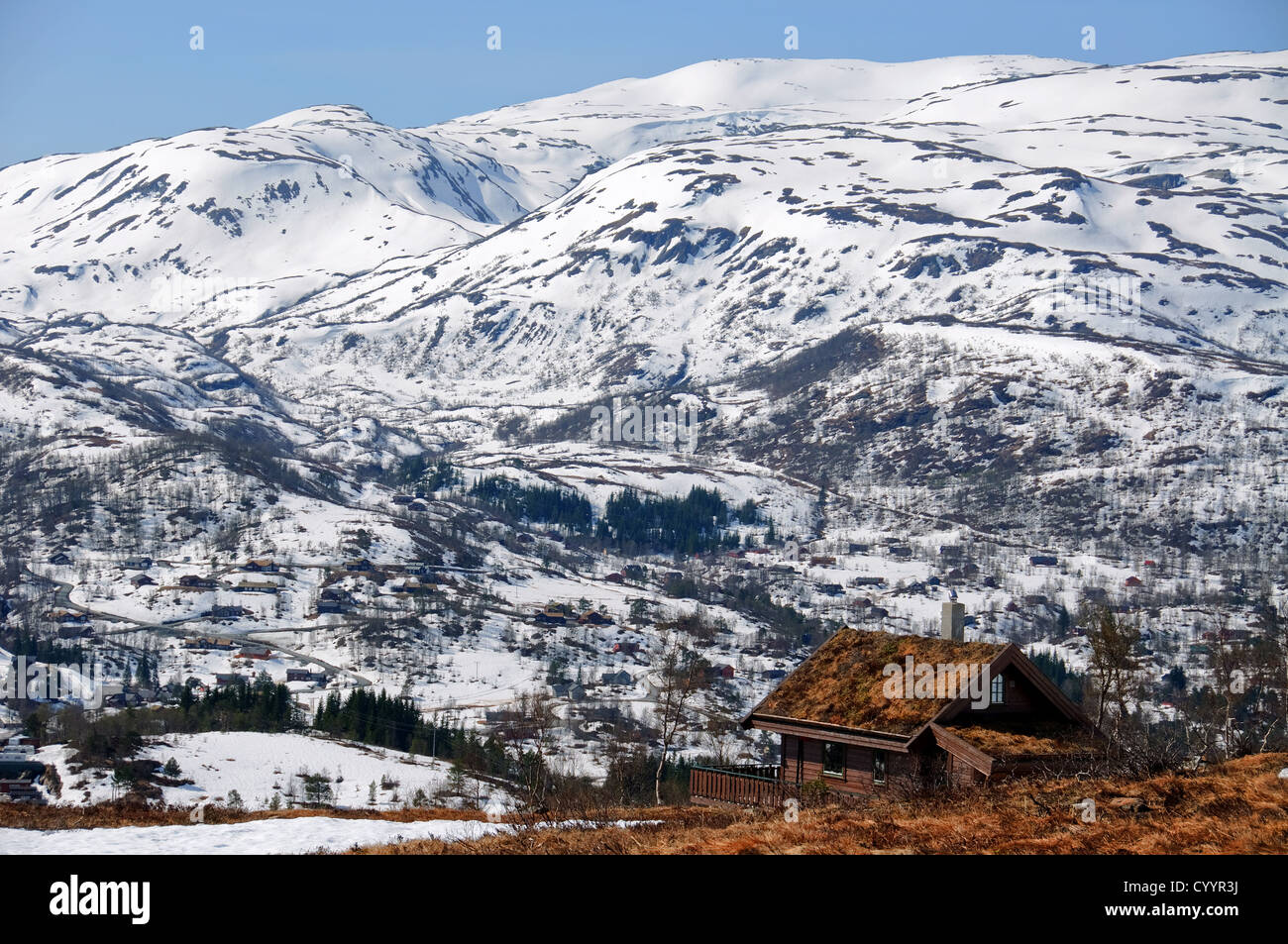 An alpine cabin on the top of a hill with panorama view Stock Photo - Alamy