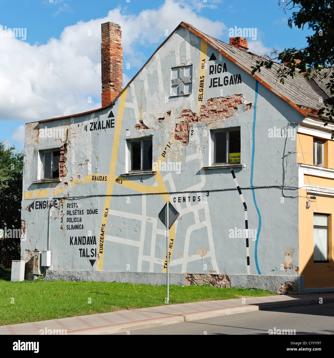 Tourist map on a house wall in the provincial small town Tukums, Latvia Stock Photo