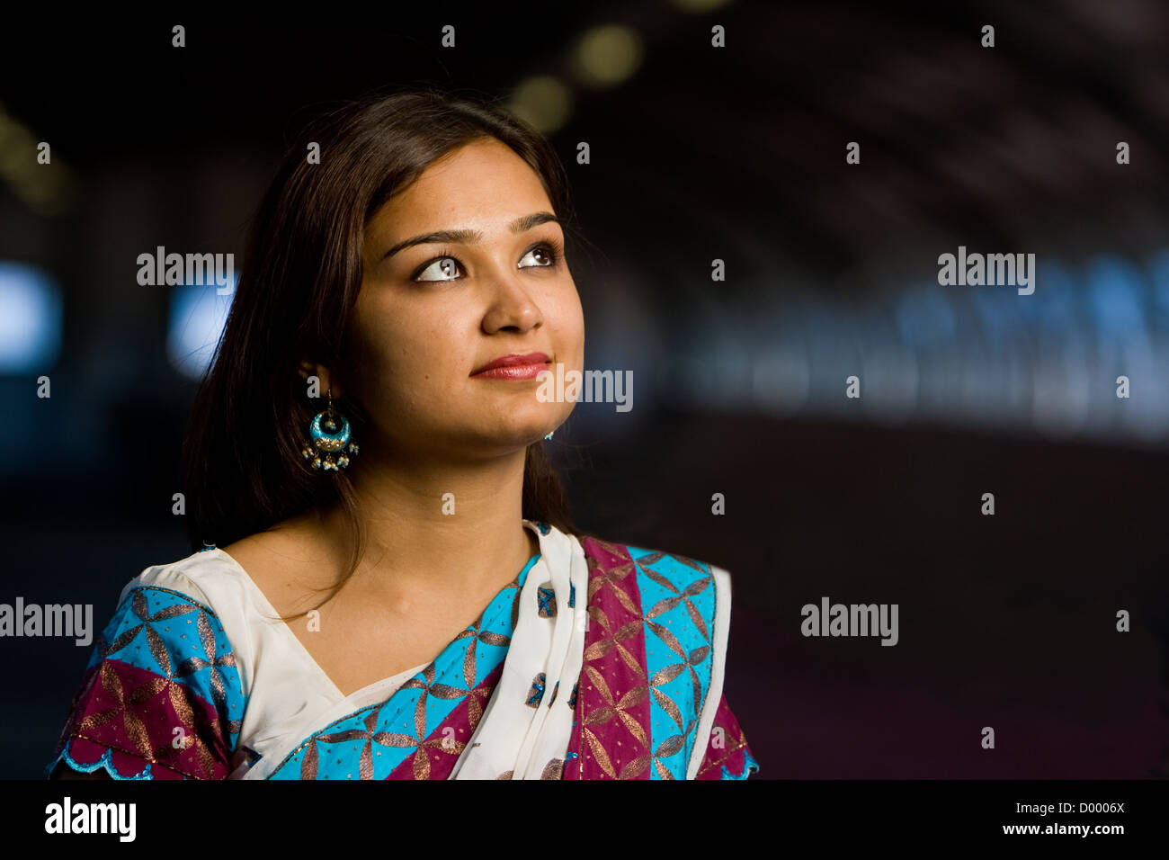 Attractive indian lady in traditional costume saree celebrating deewali