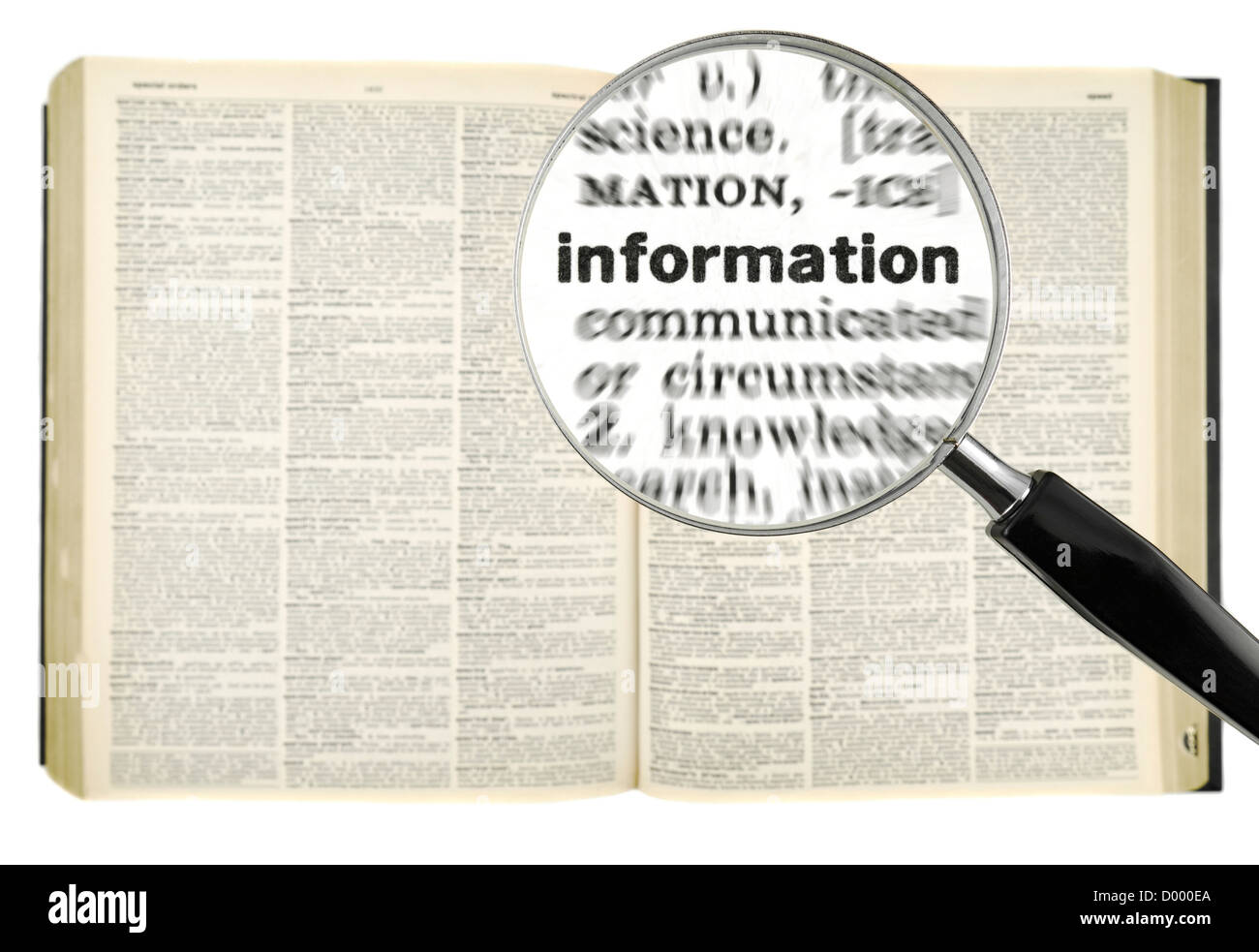 A magnifying glass on the word INFORMATION on a dictionary. Isolated on