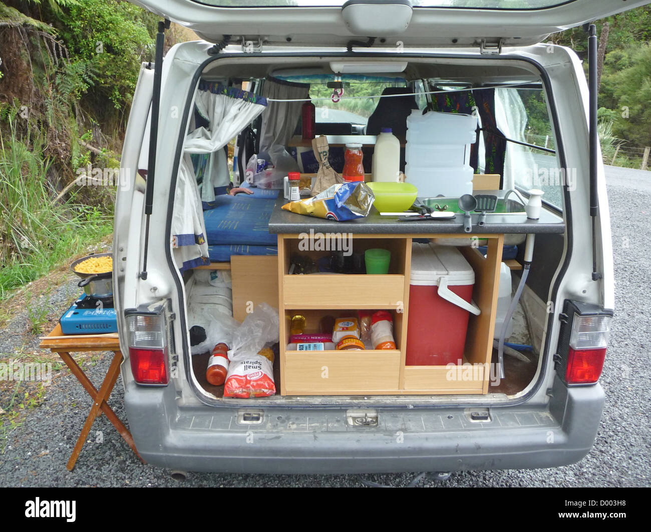 Students gap year travel camper van campervan New Zealand Wicked Campervans - basic but more than adequate for student travel. Stock Photo