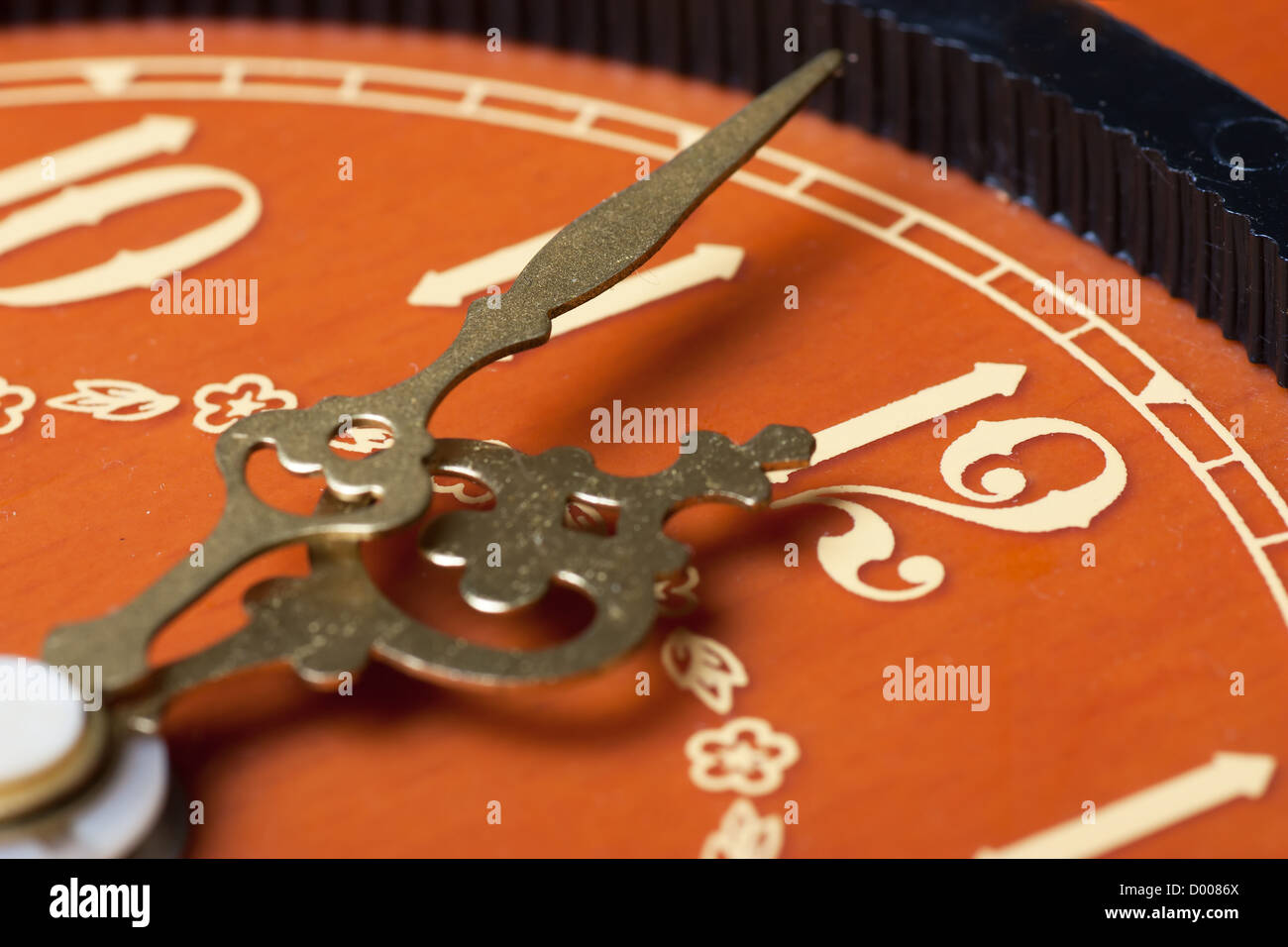 Closeup view of antique clock face. Last minutes before midnight Stock
