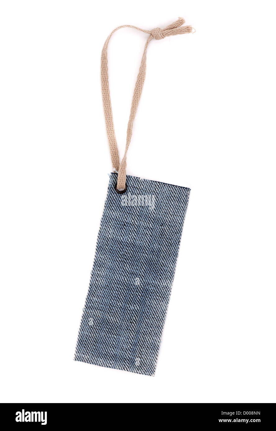 Blank denim label with rough rope. Isolate on white. Stock Photo