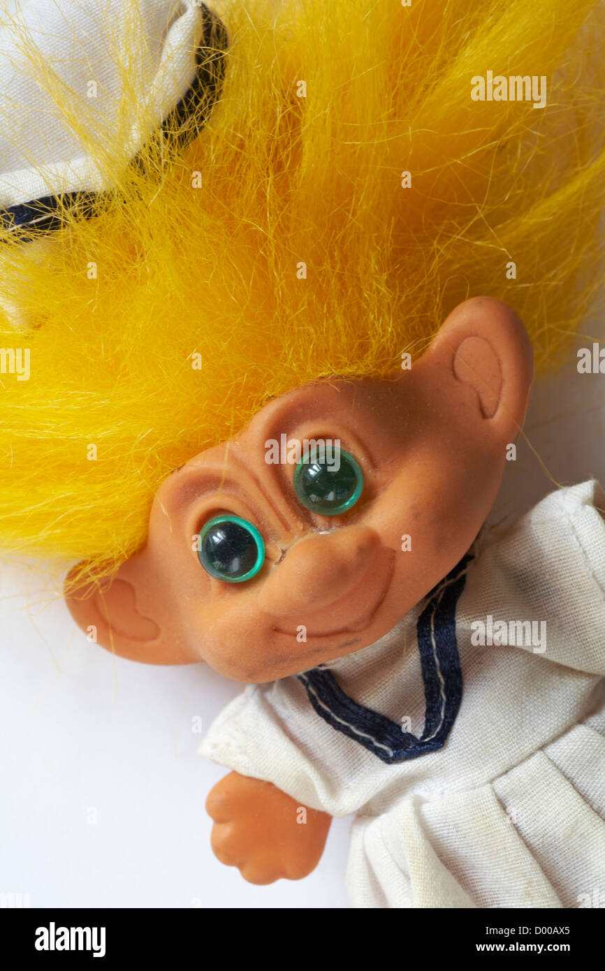 troll doll with yellow hair in uniform - troll sailor doll Stock Photo