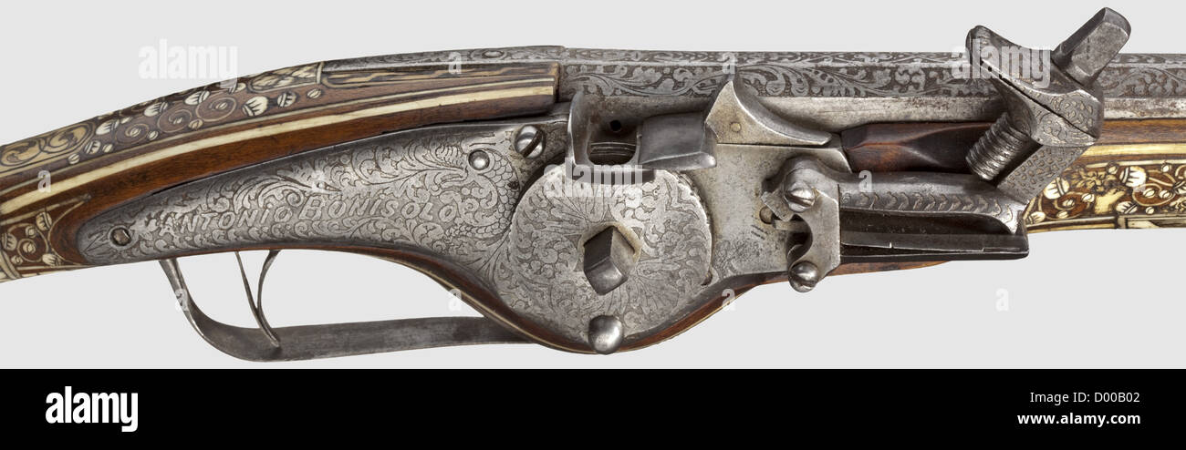 A pair of bone-inlaid wheellock pistols,Historismus period reproductions in the style of 1650,using old pieces.Octagonal barrels becoming round,smooth bores in 13 mm calibre with vine decoration etched on the rear halves of the barrels.Original,slightly different wheellocks with tankards or a 'VP' mark stamped on the inside.Floral etching on the outside of the locks,and each is signed 'ANTONIO BONISOLO'.The walnut stocks entirely inlaid with engraved and blackened bone displaying riders,hounds,and bears,amid fine vines.Iron trigger guards with flor,Additional-Rights-Clearences-Not Available Stock Photo