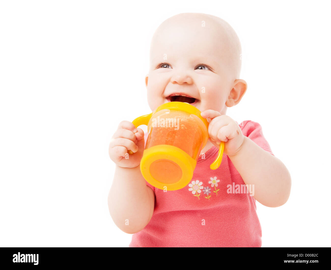 baby drinking juice isolated against white background Stock Photo Alamy