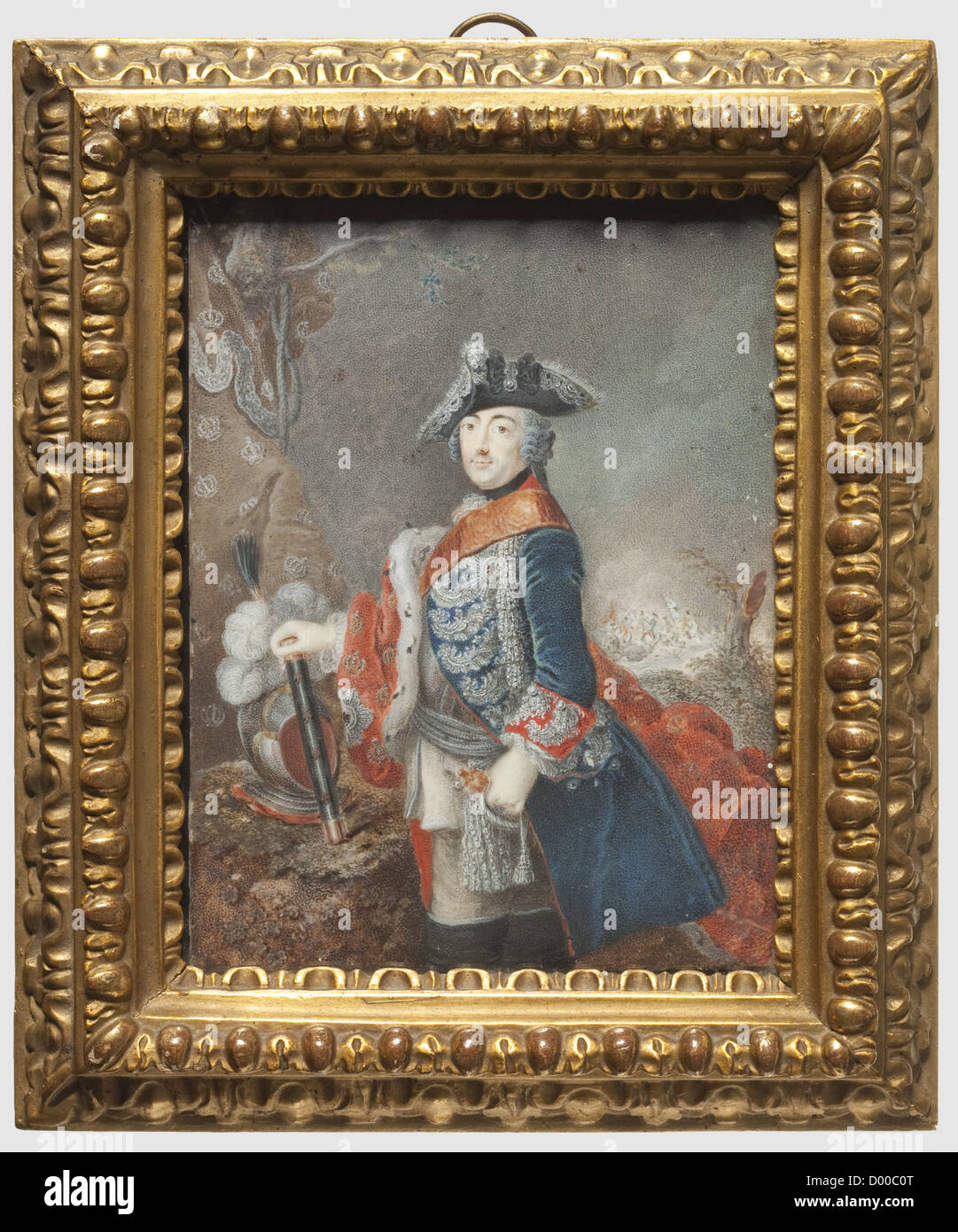 Friederich II, the Great, a miniature portrait, Three quarter portrait of the King in the richly embroidered uniform of the I Guards Battalion with a marshal's baton. Miniature after a portrait by Pesne after 1755. Gouache on ivory, 95 x 103 mm, unsigned. The high quality and style indicate a work by the court miniaturist Anton Friedrich König (1722 - 1787). König was a student of both Pesne and Blesendorf and painted most of the surviving miniature portraits of Friedrich II, which were gifts given by the King. In an old gilt moulded frame 150 x 185 mm. High qu, Stock Photo