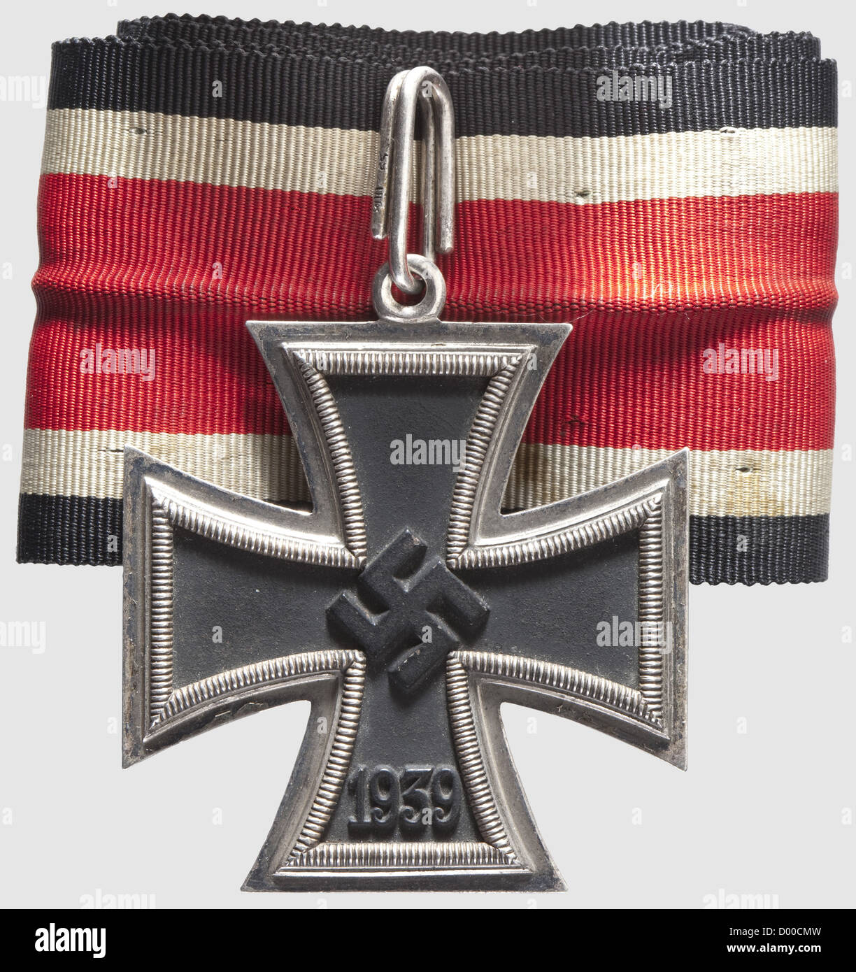 A Knight's Cross to the Iron Cross of 1939,Maker Klein & Quenzer,Idar-Oberstein. The silver frame stamped '800',the silver suspension ring '800' and '65'. Blackened iron core. Dimensions 49.1 x 48.6 mm,weight 31.92 g(Nie 7.03.08 c). Included is a 72 cm length of non-customised neck ribbon(stained),historic,historical,1930s,20th century,awards,award,German Reich,Third Reich,Nazi era,National Socialism,object,objects,stills,medal,decoration,medals,decorations,clipping,cut out,cut-out,cut-outs,honor,honour,National Socialist,Nazi,Na,Additional-Rights-Clearences-Not Available Stock Photo