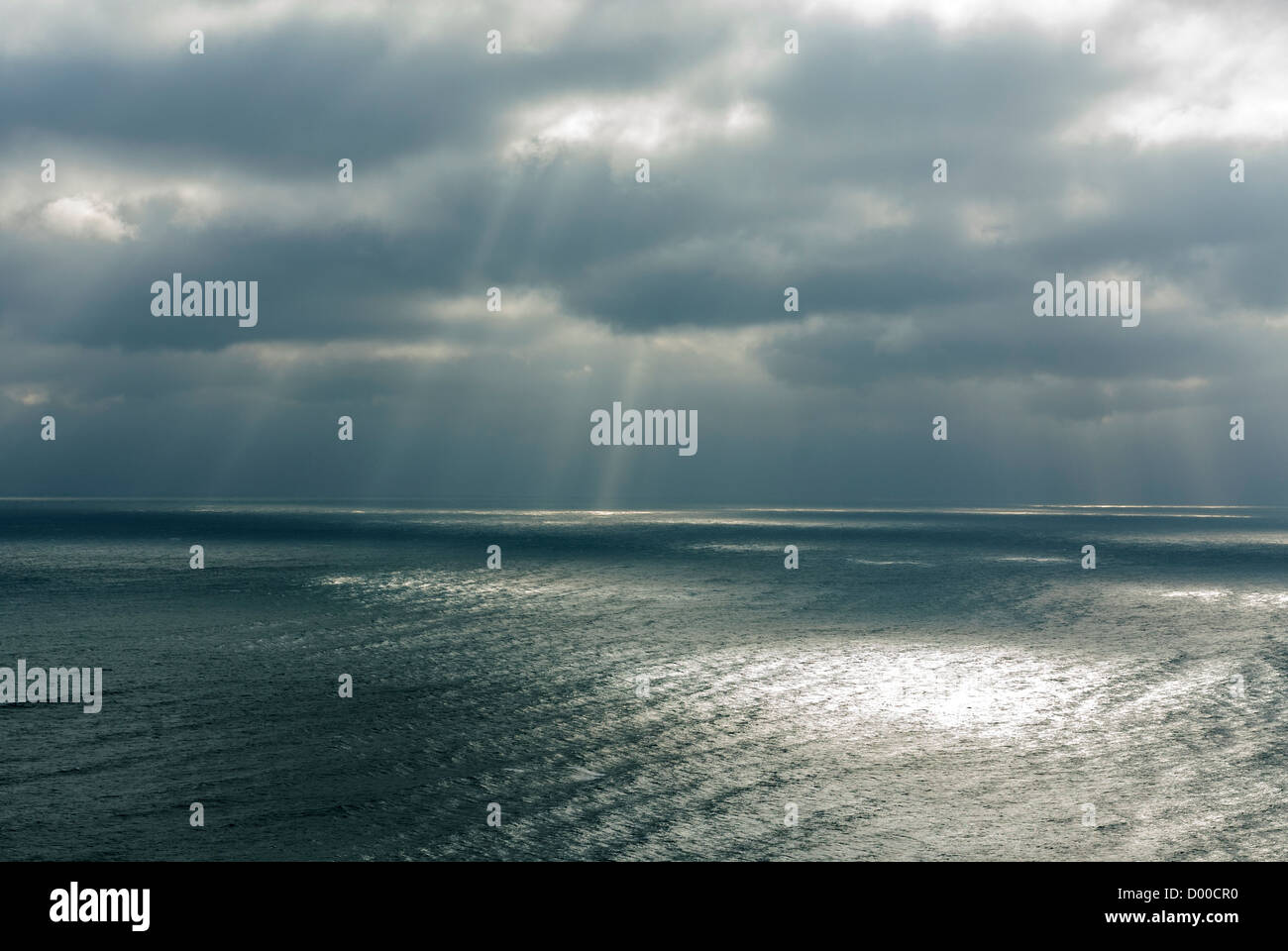 sea winter sun godrays rays clouds weather Stock Photo