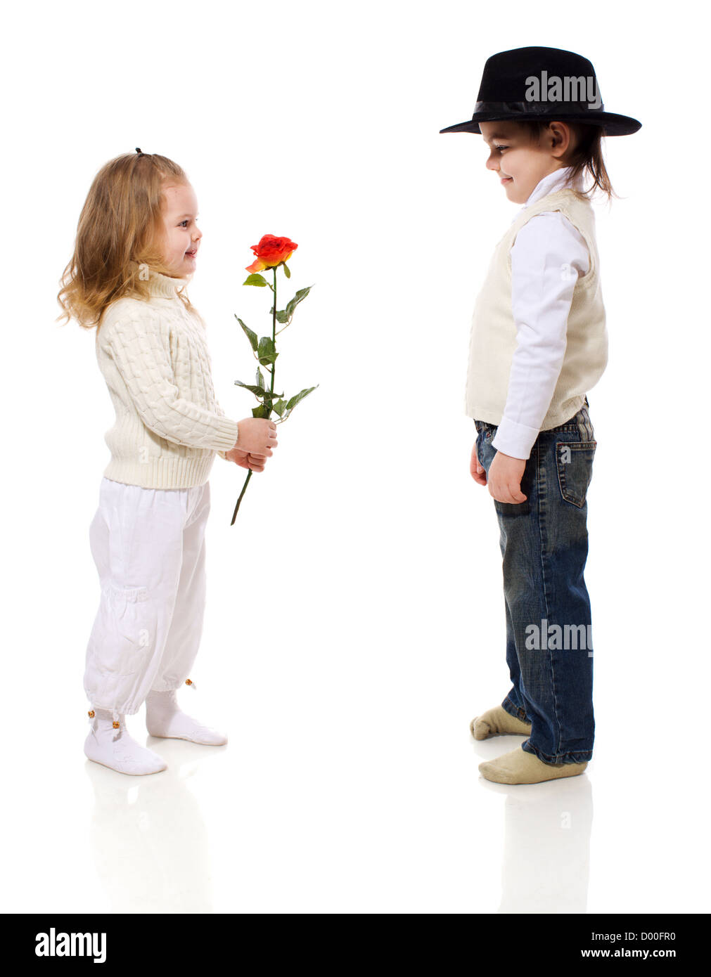 boy giving rose for his little girlfriend isolated on white Stock Photo -  Alamy