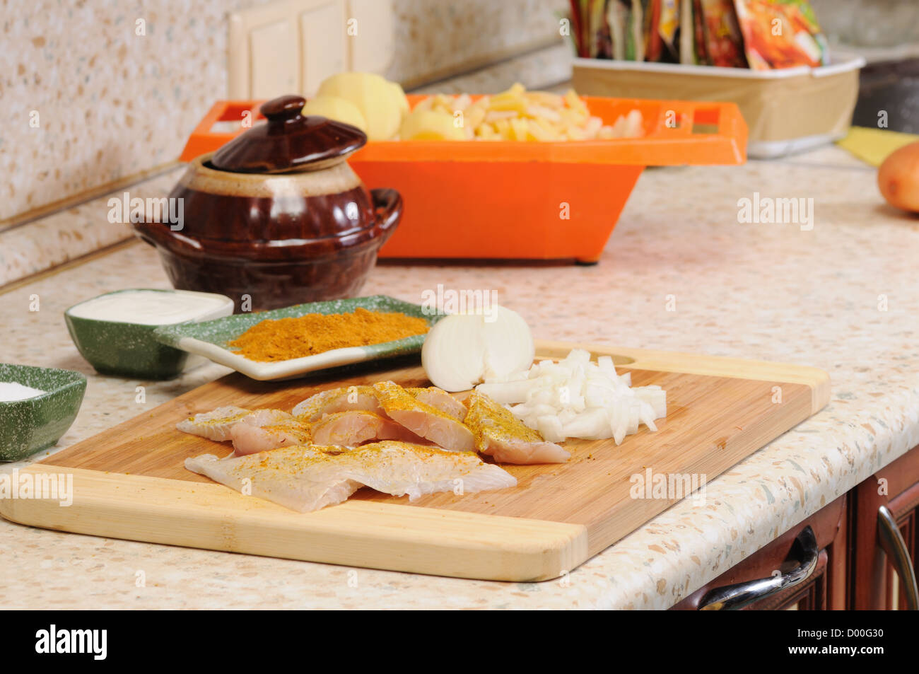 Meal preparation on kitchen from a fish Stock Photo - Alamy
