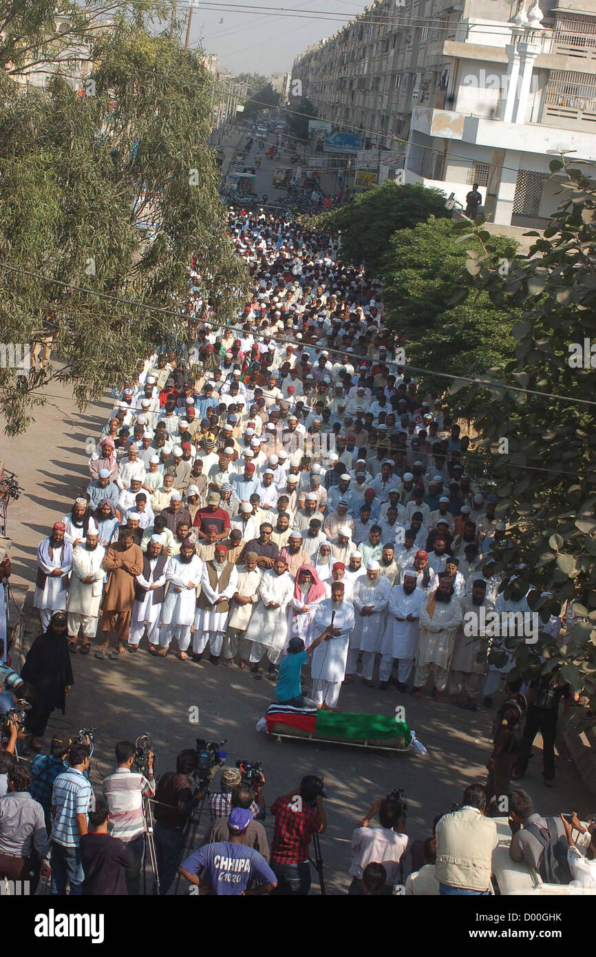 Activists of Ahle Sunnat Wal Jamat (Defunct Sipah-e- Shaba) offer prayer of their activist Muhammad Irfan who killed yesterday in North Karachi by  unidentified gunmen, at Jama Masjid Siddique-e-Akbar near Nagan Chowrangi in Karachi on  Tuesday, November 13, 2012. Stock Photo