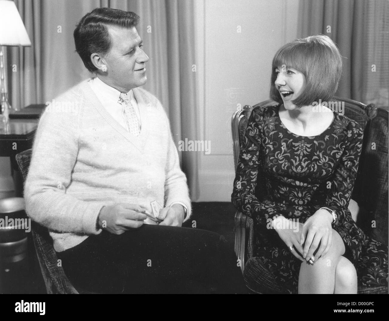 CILLA BLACK  UK pop singer in 1964 with TV interviwer Bernard Braden Stock Photo