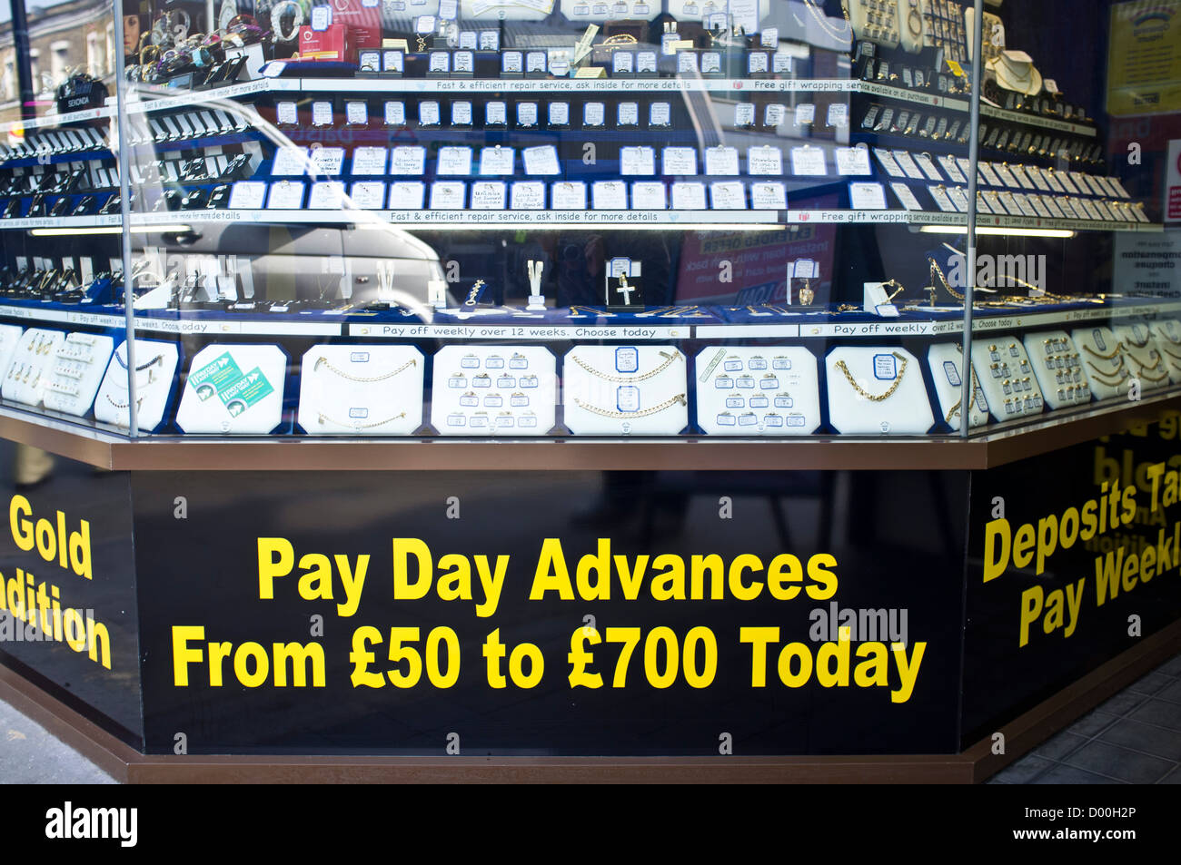 The shop front to a pawnbrokers in Dalston, London, UK offering pay day loans. Stock Photo